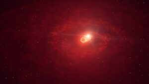 Künstlerische Darstellung des RS-Ophiuchi-Binär-Sternsystems, das aus einem Weißen Zwerg (im Hintergrund) und einem Roten Riesen besteht, die sich umkreisen. Material des Roten Riesen wird kontinuierlich von seinem Begleitstern aufgesogen. (Bild: DESY/H.E.S.S., Science Communication Lab.)